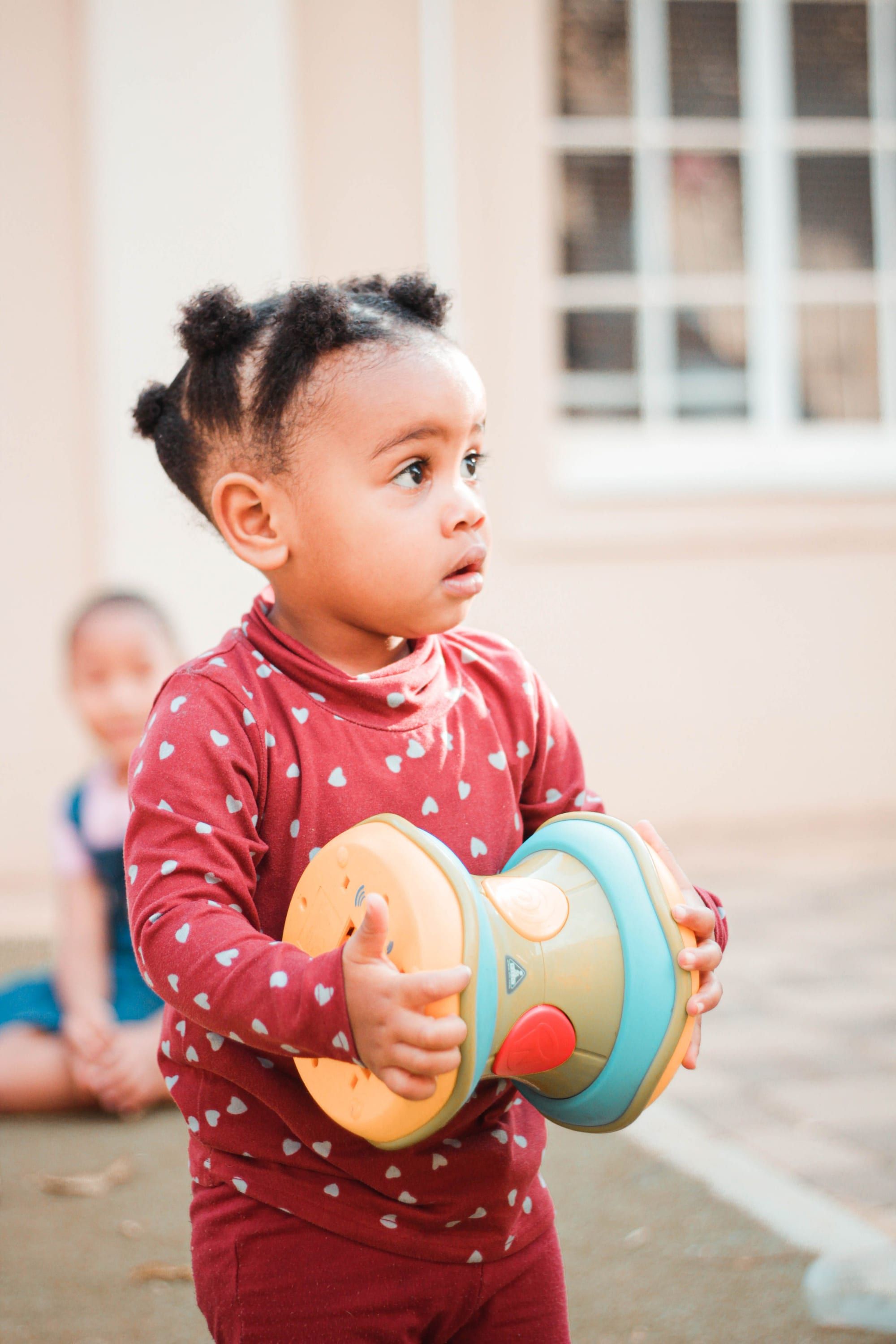 Toddler playing outdoors